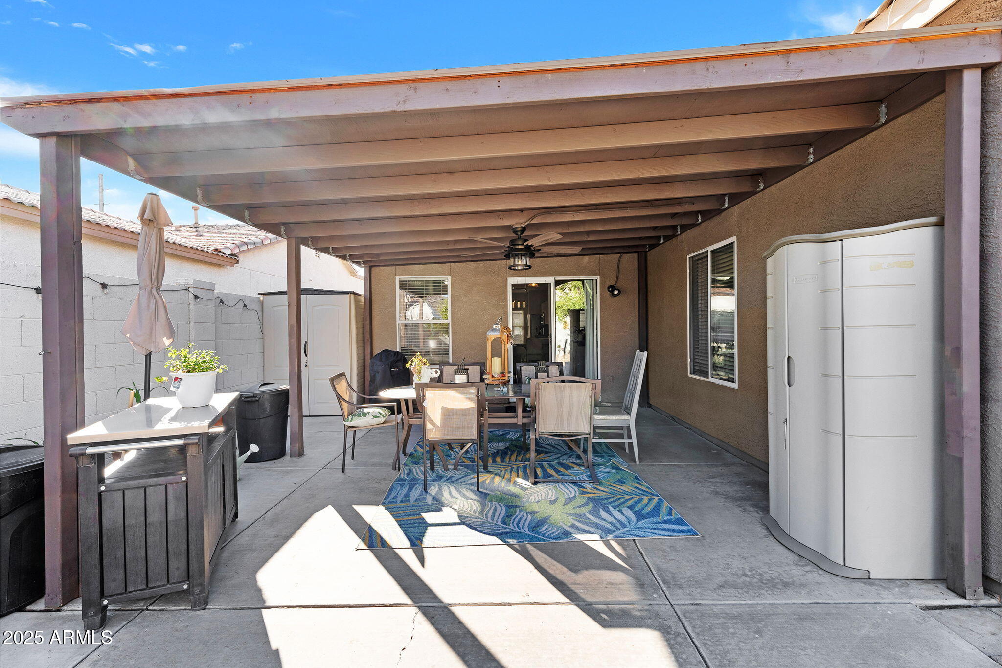 13122 West Calavar Road Surprise, AZ 85379 - Photo 31 of 34 a view of a dining room with furniture window and outside view