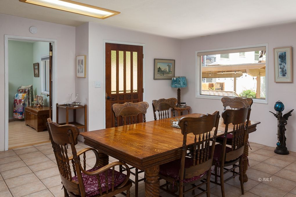 110 North Hay Street Lone Pine, CA 93545 - Photo 10 of 23 a view of a dining room with furniture and window