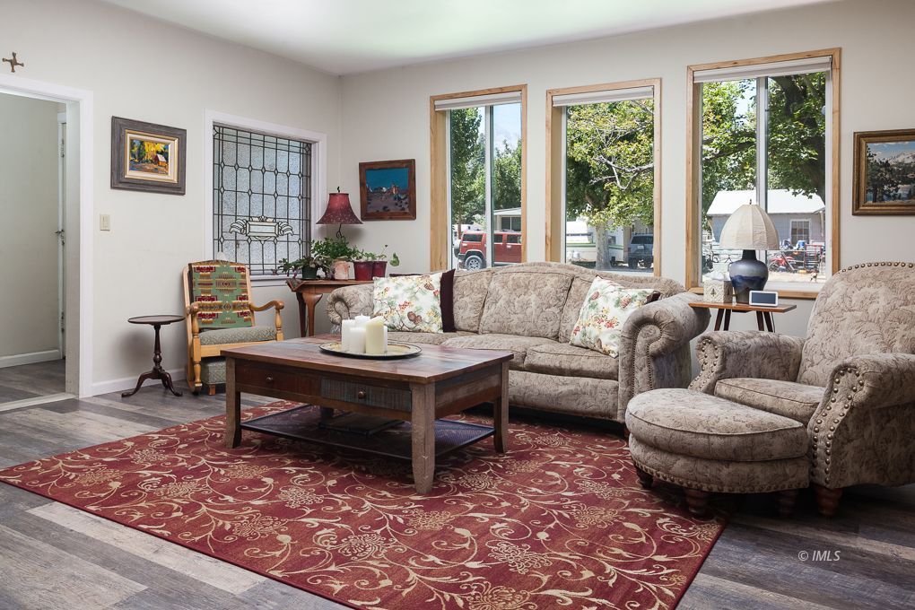 110 North Hay Street Lone Pine, CA 93545 - Photo 13 of 23 a living room with furniture and a rug