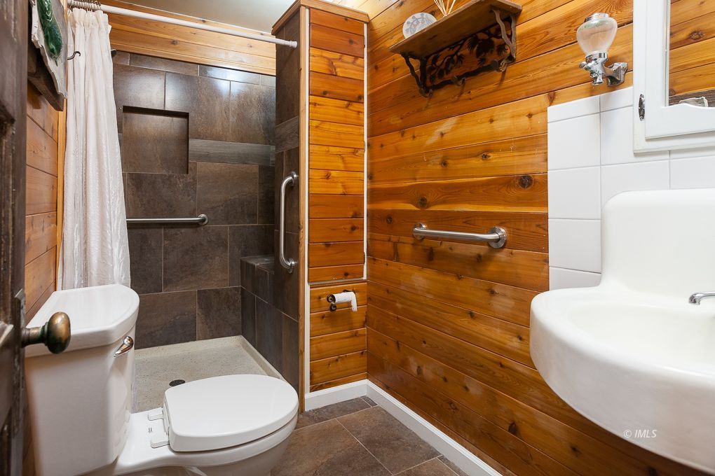 110 North Hay Street Lone Pine, CA 93545 - Photo 18 of 23 a bathroom with a toilet and a shower