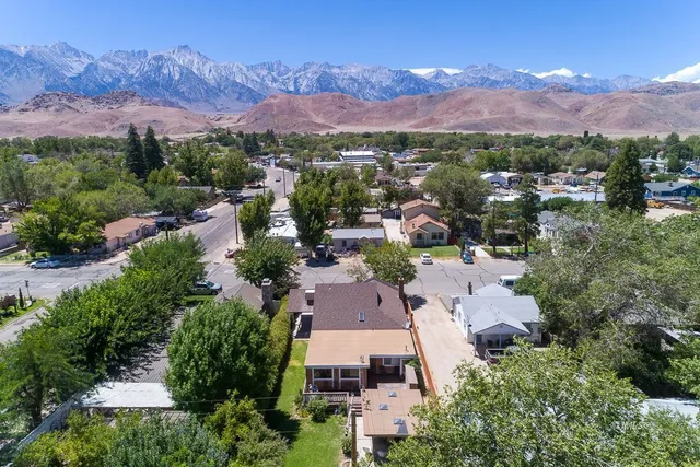 an aerial view of a city with lots of residential buildings