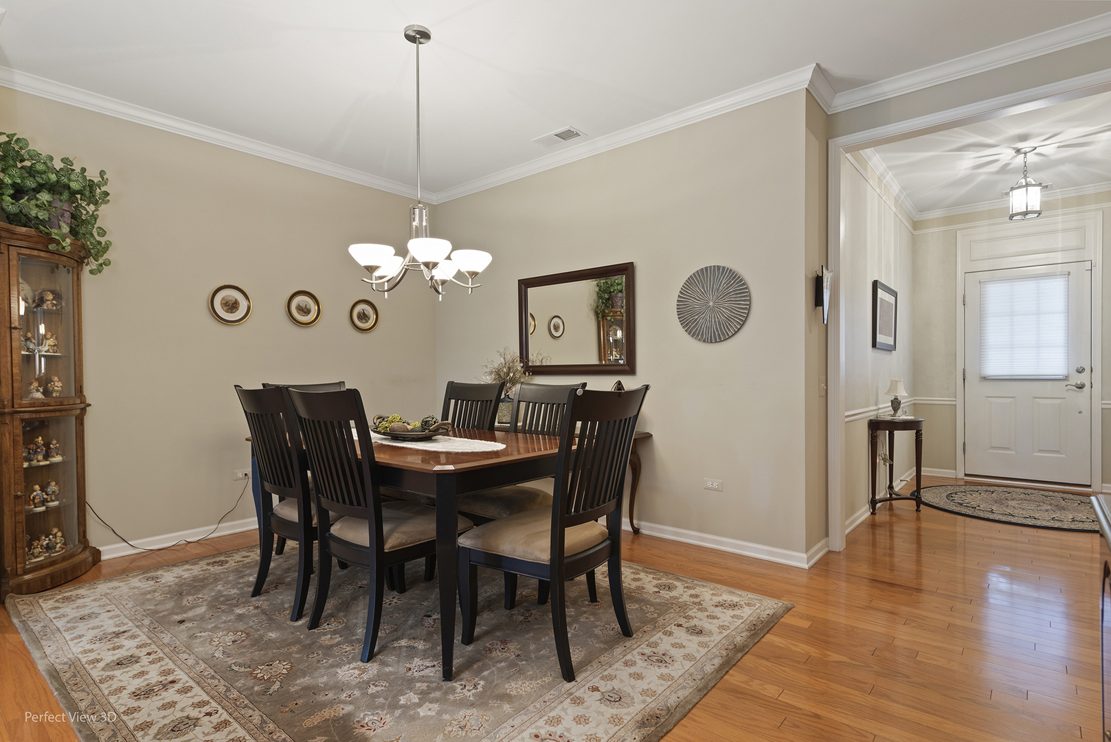 2468 Rolling Ridge Elgin, IL 60124 - Photo 12 of 29 a dining room with furniture and wooden floor