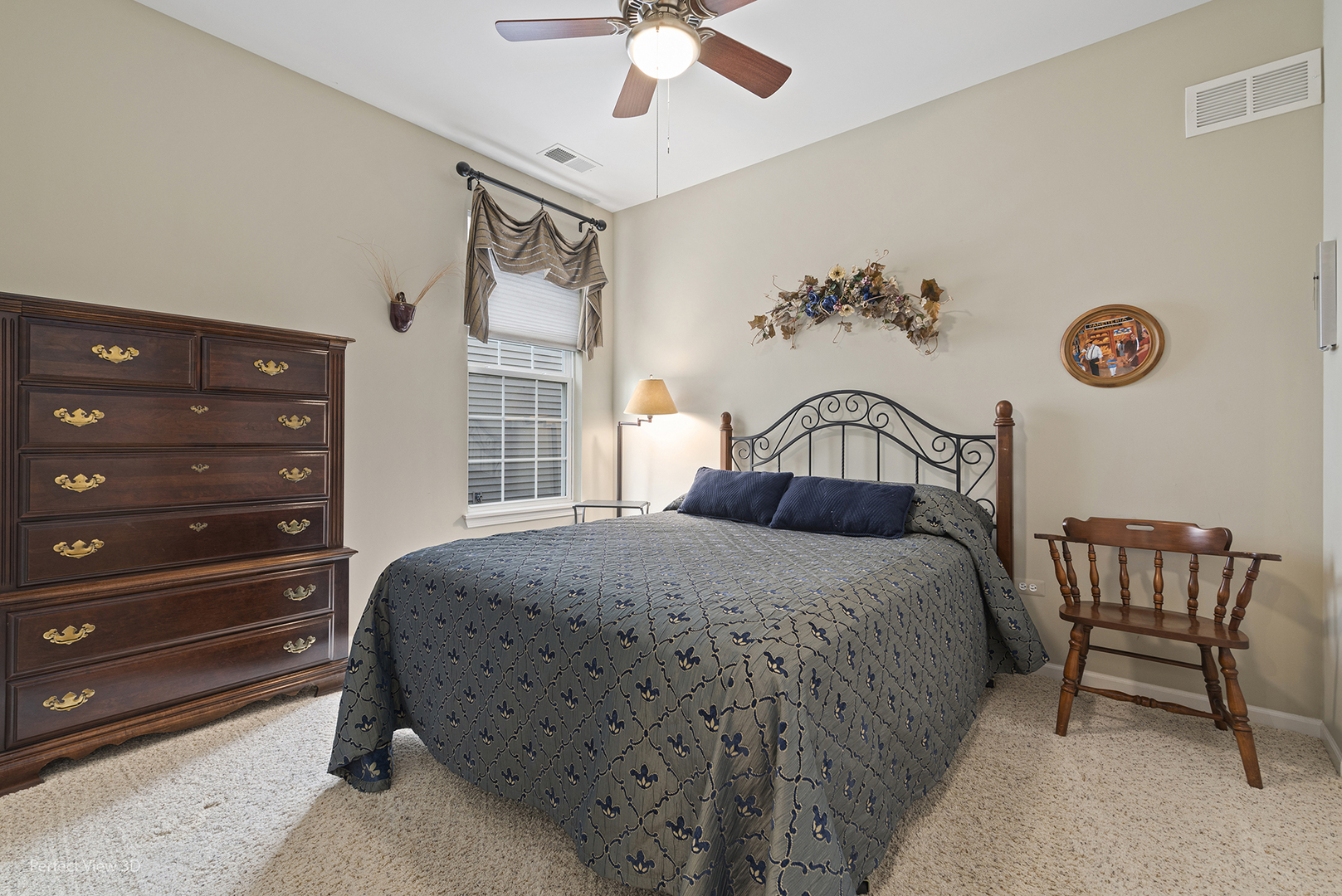2468 Rolling Ridge Elgin, IL 60124 - Photo 20 of 29 a bedroom with a bed and a chandelier