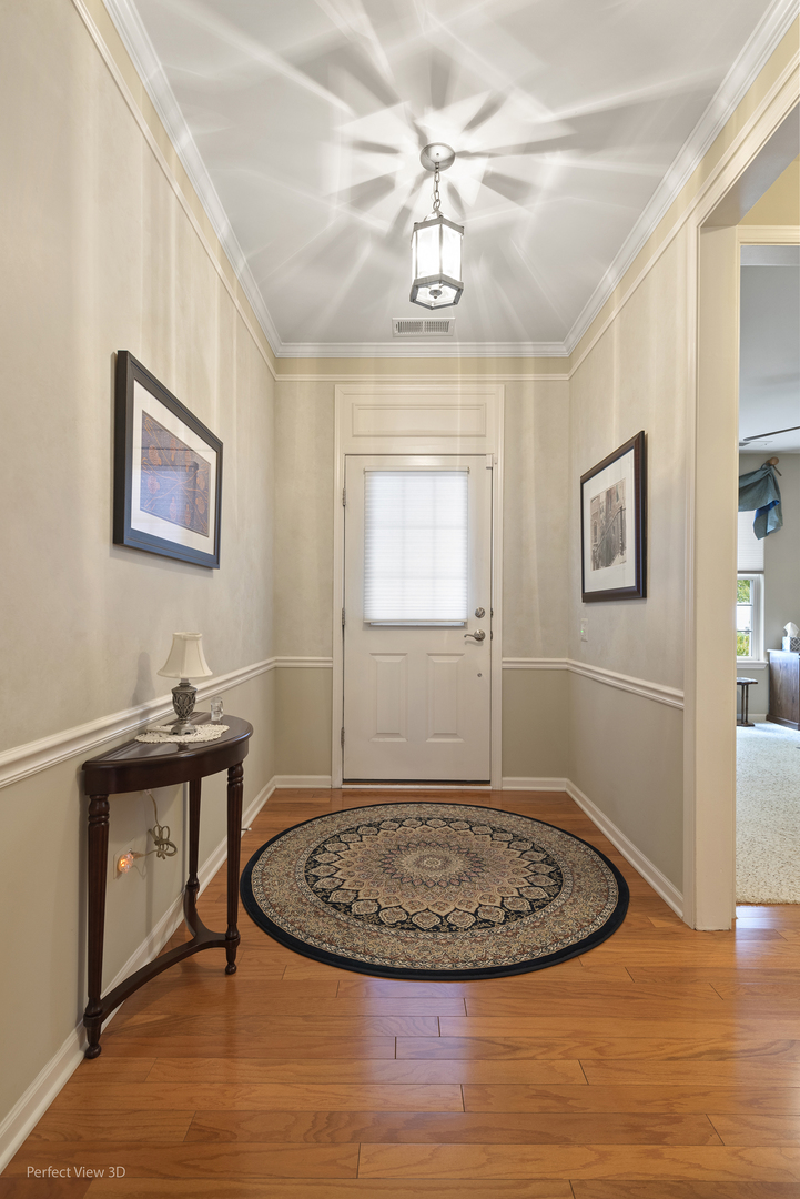 2468 Rolling Ridge Elgin, IL 60124 - Photo 21 of 29 a view of a livingroom with furniture and hardwood floor