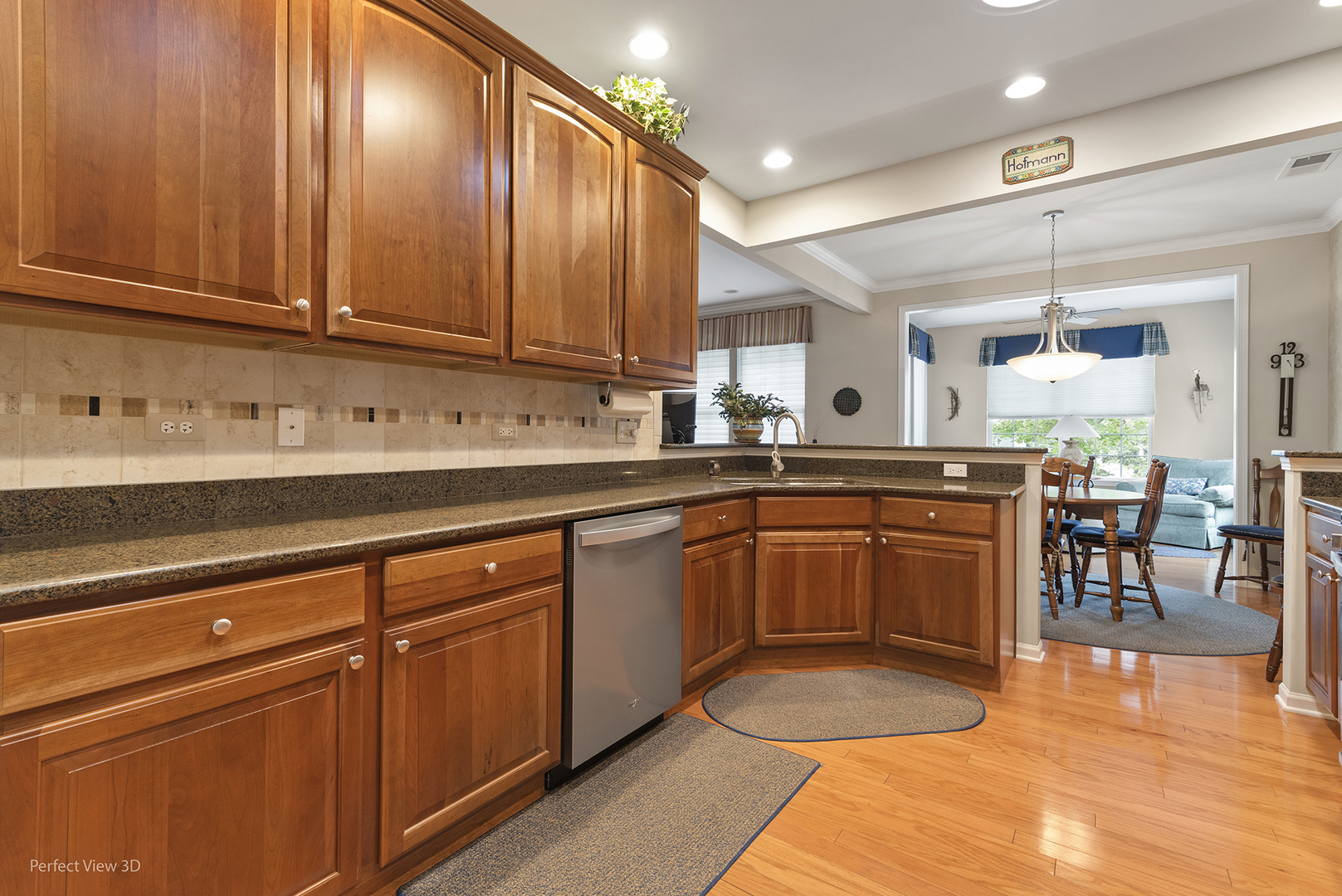 2468 Rolling Ridge Elgin, IL 60124 - Photo 5 of 29 a kitchen with stainless steel appliances granite countertop a sink and cabinets