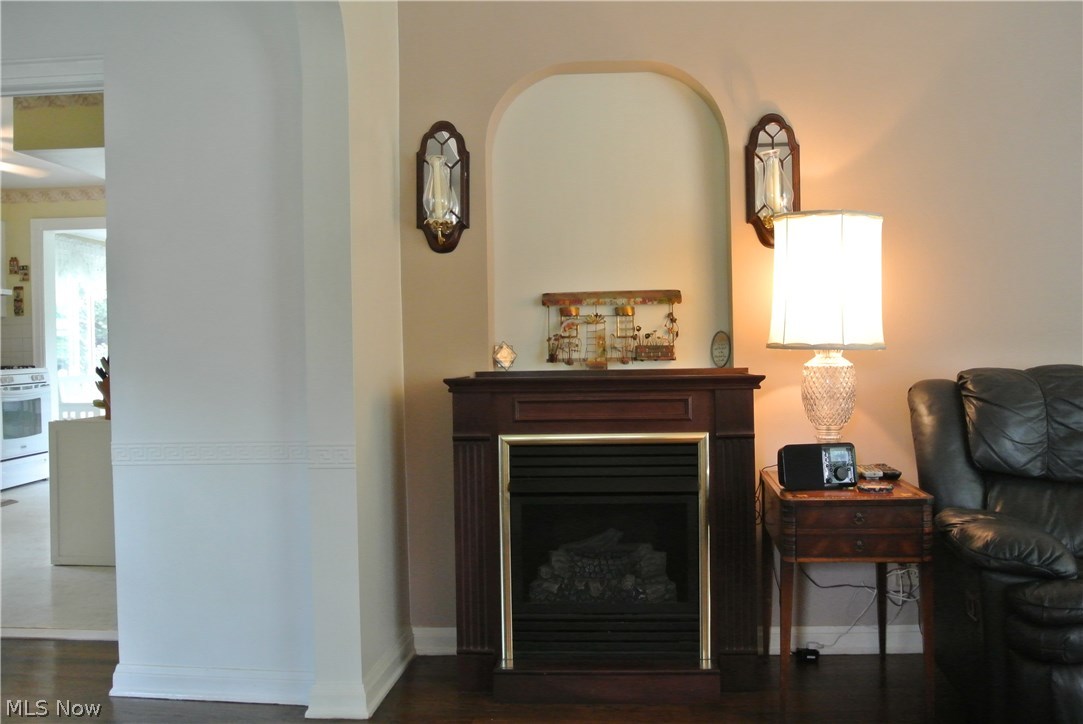 2945 Hillside Road Independence, OH 44131 - Photo 9 of 35 Gas fireplace is visible from both rooms.