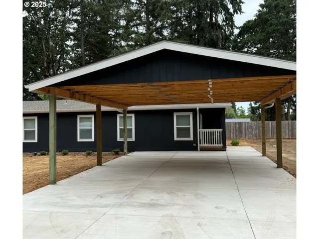a front view of a house with yard