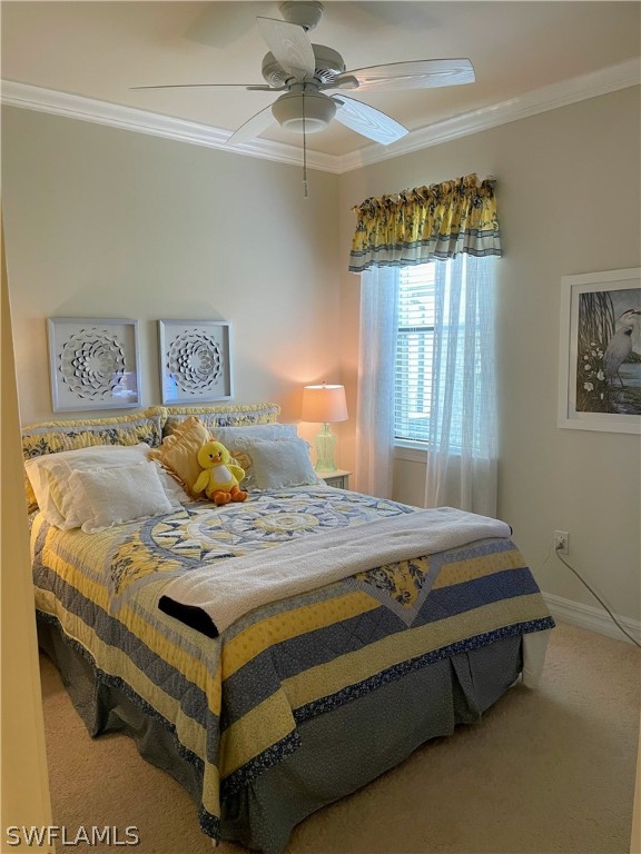 10934 Dennington Road Fort Myers, FL 33913 - Photo 13 of 15 a bedroom with a bed and window