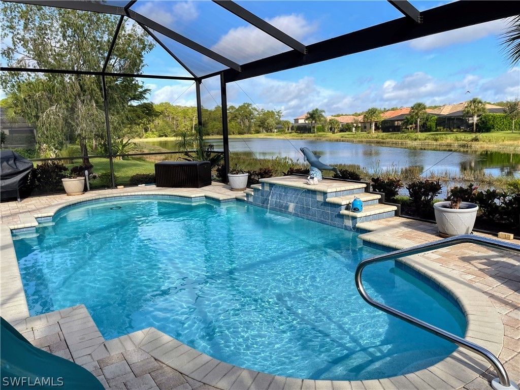 10934 Dennington Road Fort Myers, FL 33913 - Photo 3 of 15 a view of a swimming pool with lounge chair