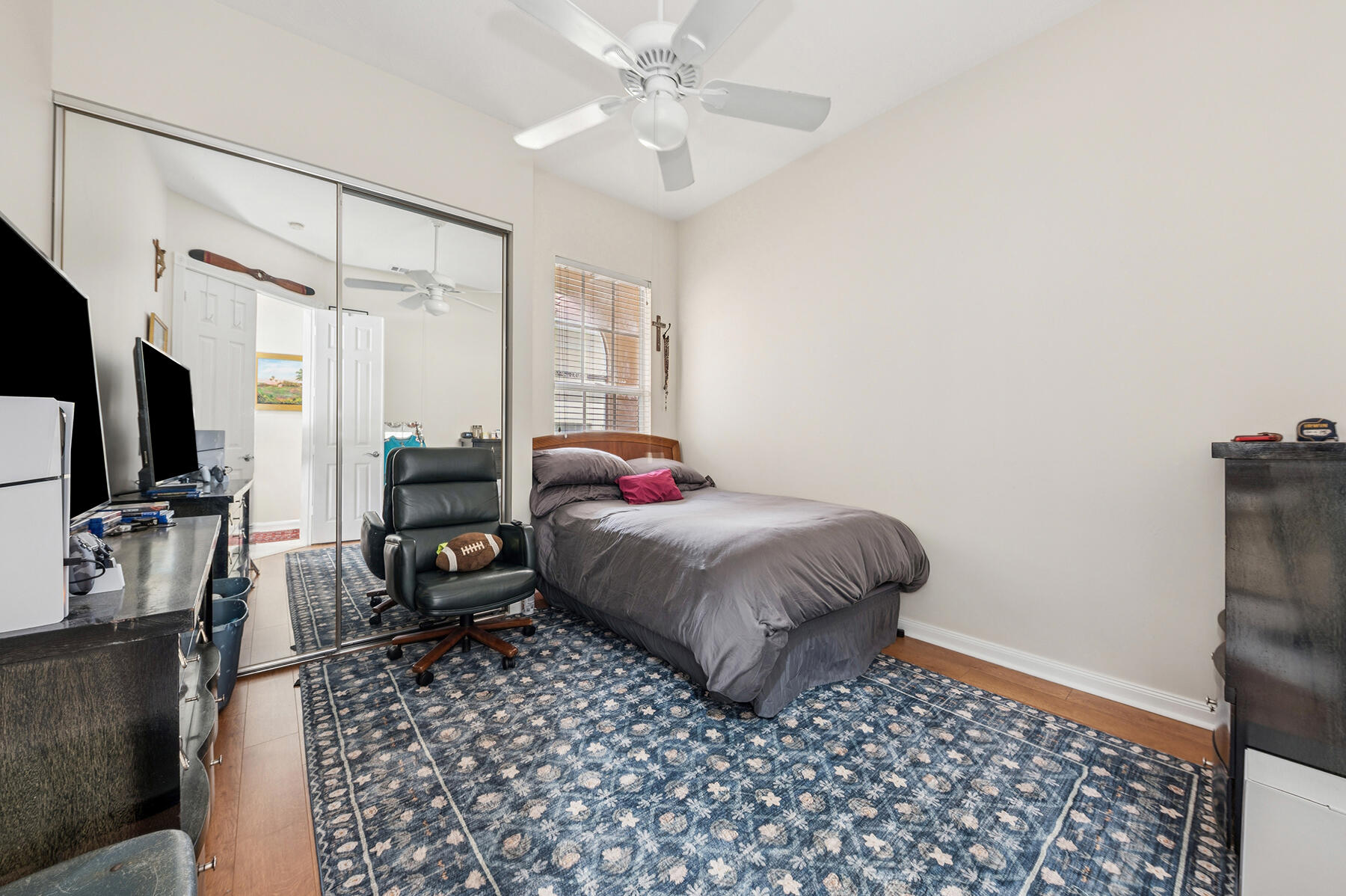 2613 James River Road West Palm Beach, FL 33411 - Photo 16 of 57 a bedroom with a bed and a flat screen tv