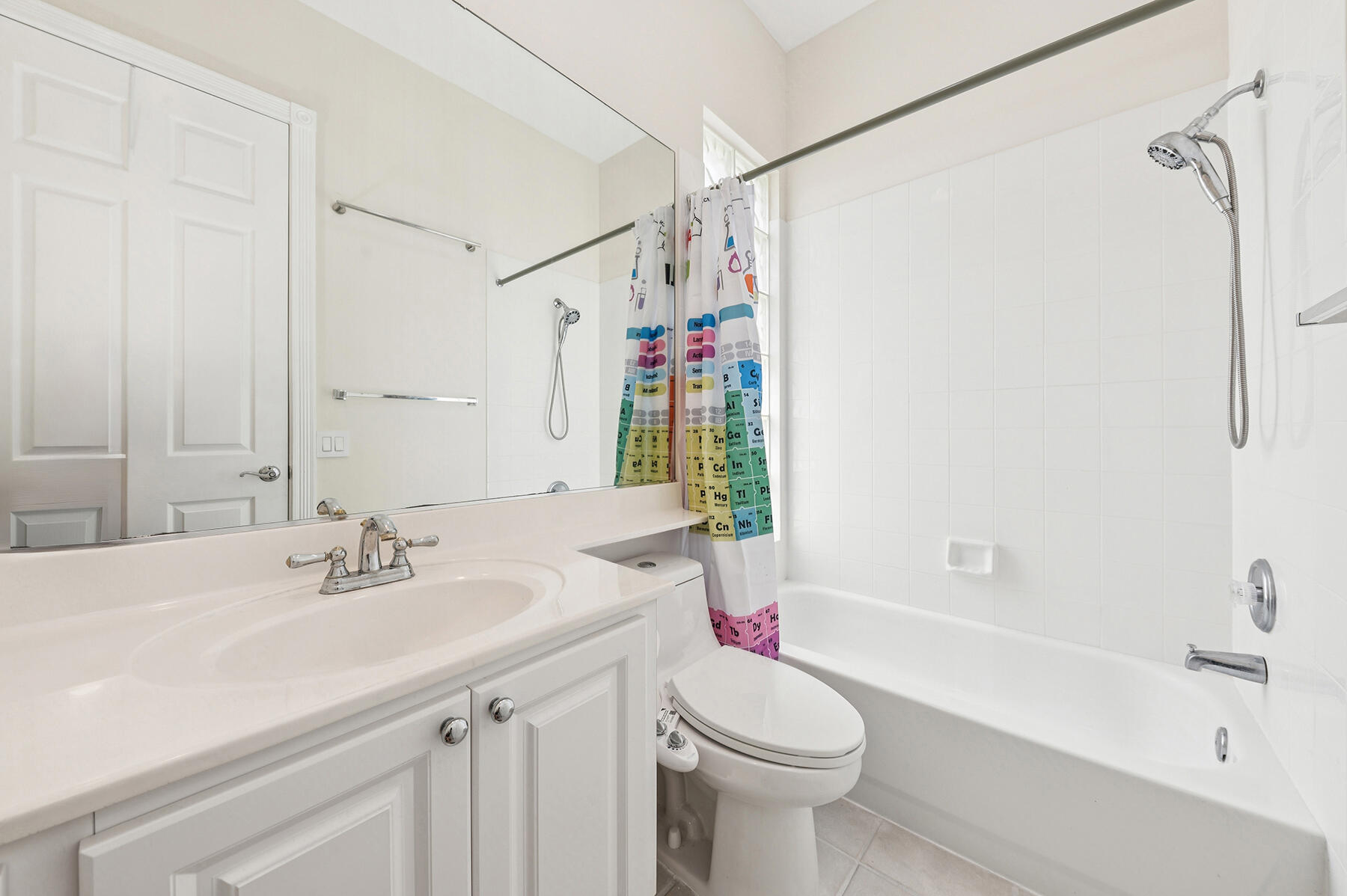 2613 James River Road West Palm Beach, FL 33411 - Photo 17 of 57 a bathroom with a sink toilet vanity and shower