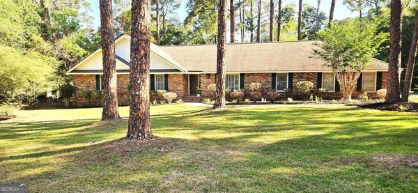 a view of a house with a swimming pool