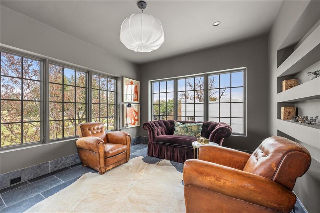 4259 Crestline Road Fort Worth, TX 76107 - Photo 18 of 40 a living room with furniture and a large window