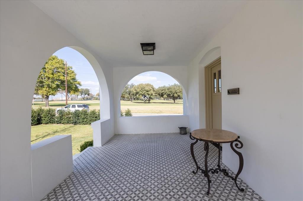 4259 Crestline Road Fort Worth, TX 76107 - Photo 31 of 40 a view of workspace with wooden floor and a window