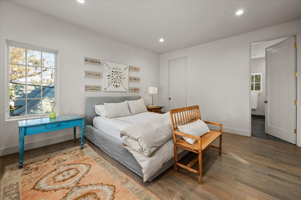 4259 Crestline Road Fort Worth, TX 76107 - Photo 35 of 40 a bed room with a bed and windows