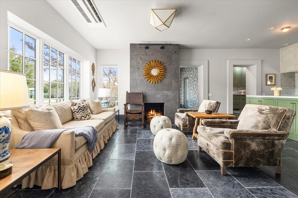 4259 Crestline Road Fort Worth, TX 76107 - Photo 4 of 40 a living room with furniture and a fireplace
