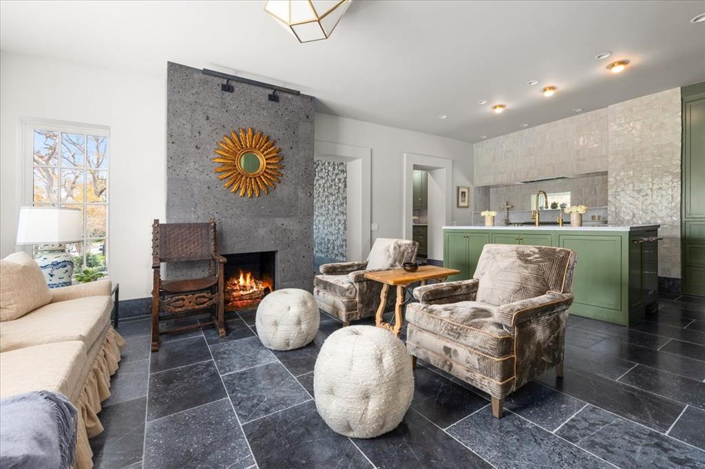 4259 Crestline Road Fort Worth, TX 76107 - Photo 5 of 40 a living room with fireplace furniture and a fireplace