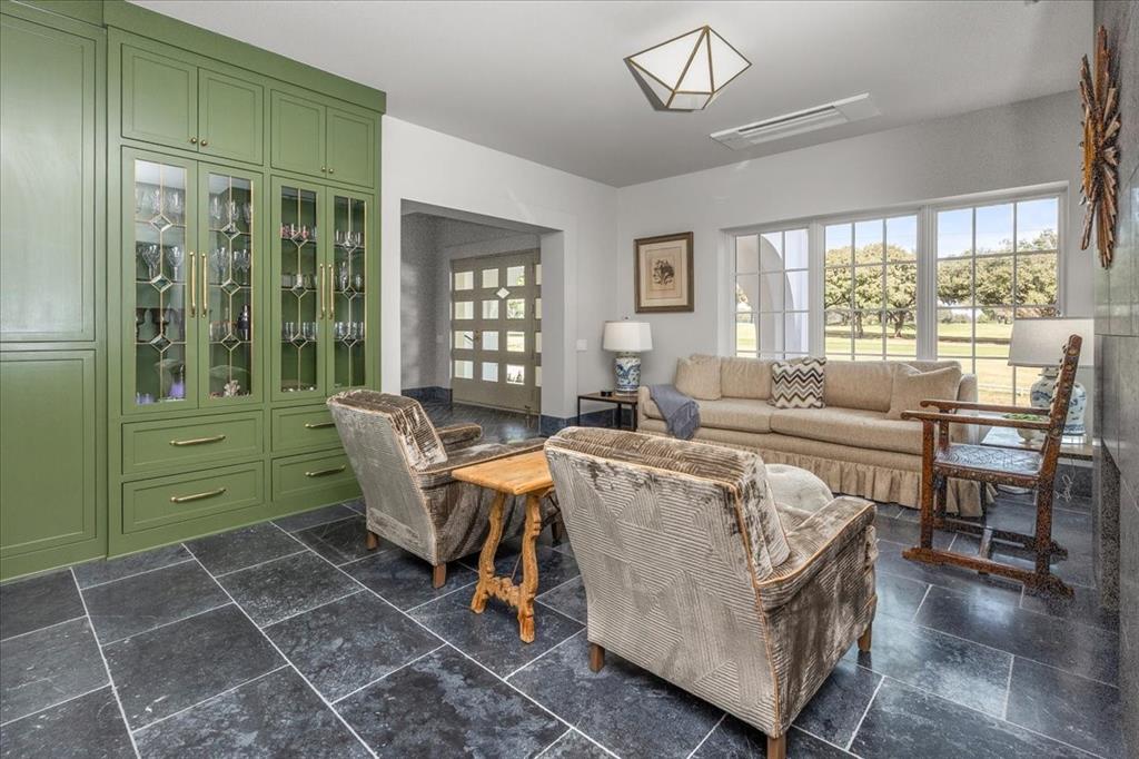 4259 Crestline Road Fort Worth, TX 76107 - Photo 7 of 40 a living room with furniture and a large window
