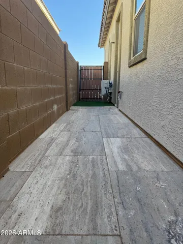 a view of a car garage with a parked car