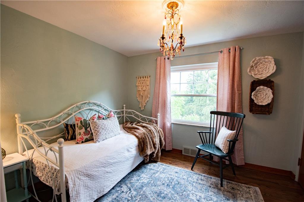 402 Fort Couch Road Pittsburgh, PA 15241 - Photo 12 of 25 huge window, large closet,neutral paint, this room currently has a fun girly chandelier but could be a guest room or a boys room w the change of a light fixture...