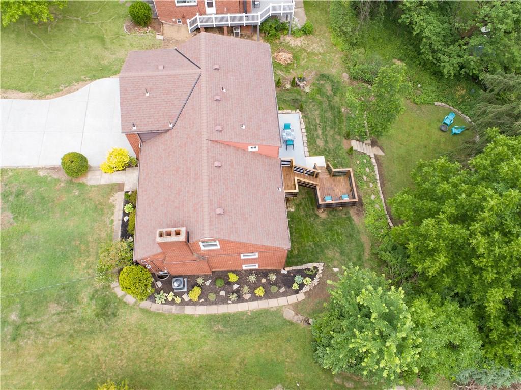 402 Fort Couch Road Pittsburgh, PA 15241 - Photo 20 of 25 from the aeriel you can see the brand new driveway, brnd new a/c unit new landscaping,beautiful stone wall, and flat backyard..sit on your deck or on your patio while others play, garden, or run-a-muck!