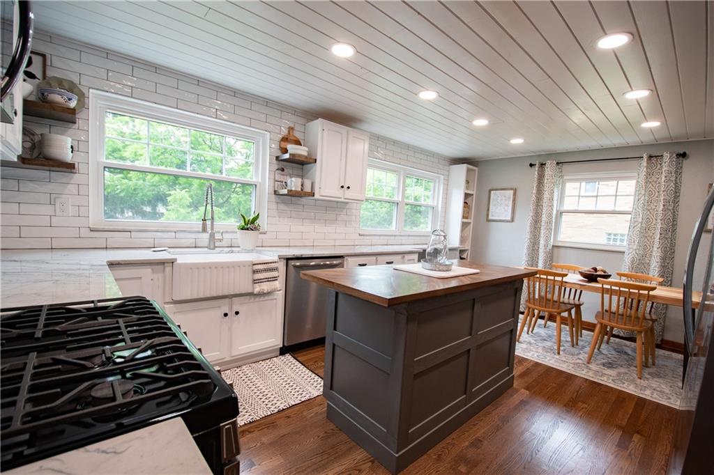 402 Fort Couch Road Pittsburgh, PA 15241 - Photo 6 of 25 Look at these massive windows, light flooding in and think of how happy you will feel when you wake up walking into this room to make your coffee