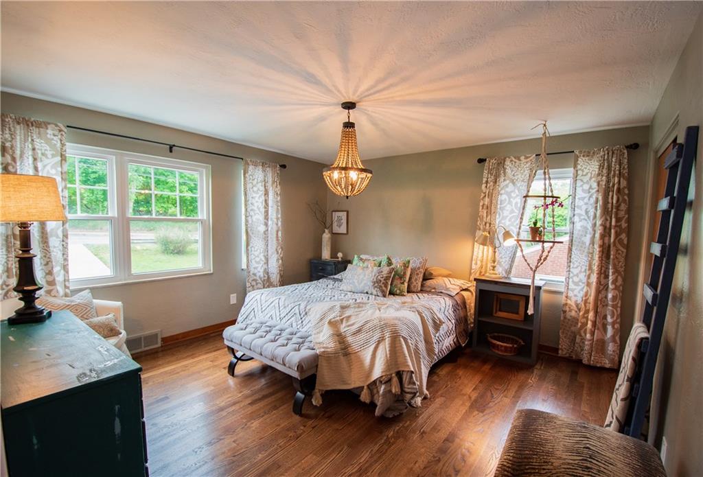 402 Fort Couch Road Pittsburgh, PA 15241 - Photo 9 of 25 4 windows, hardwood floors, a large double closet, and beaded chandelier make this a great room to use as a master...