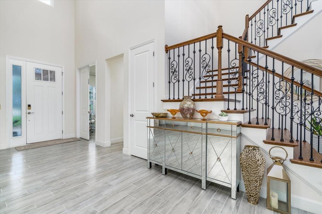 1296 Waterview Ridge Circle Apopka, FL 32703 - Photo 13 of 60 a view of entryway with wooden floor
