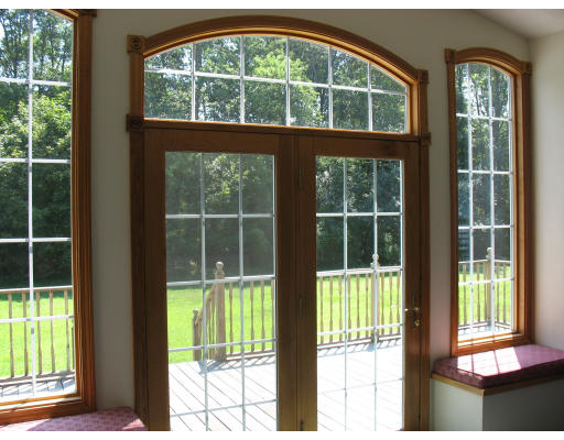 55 Deer Run Road Wrentham, MA 02093 - Photo 4 of 14 a view of a house with a large window