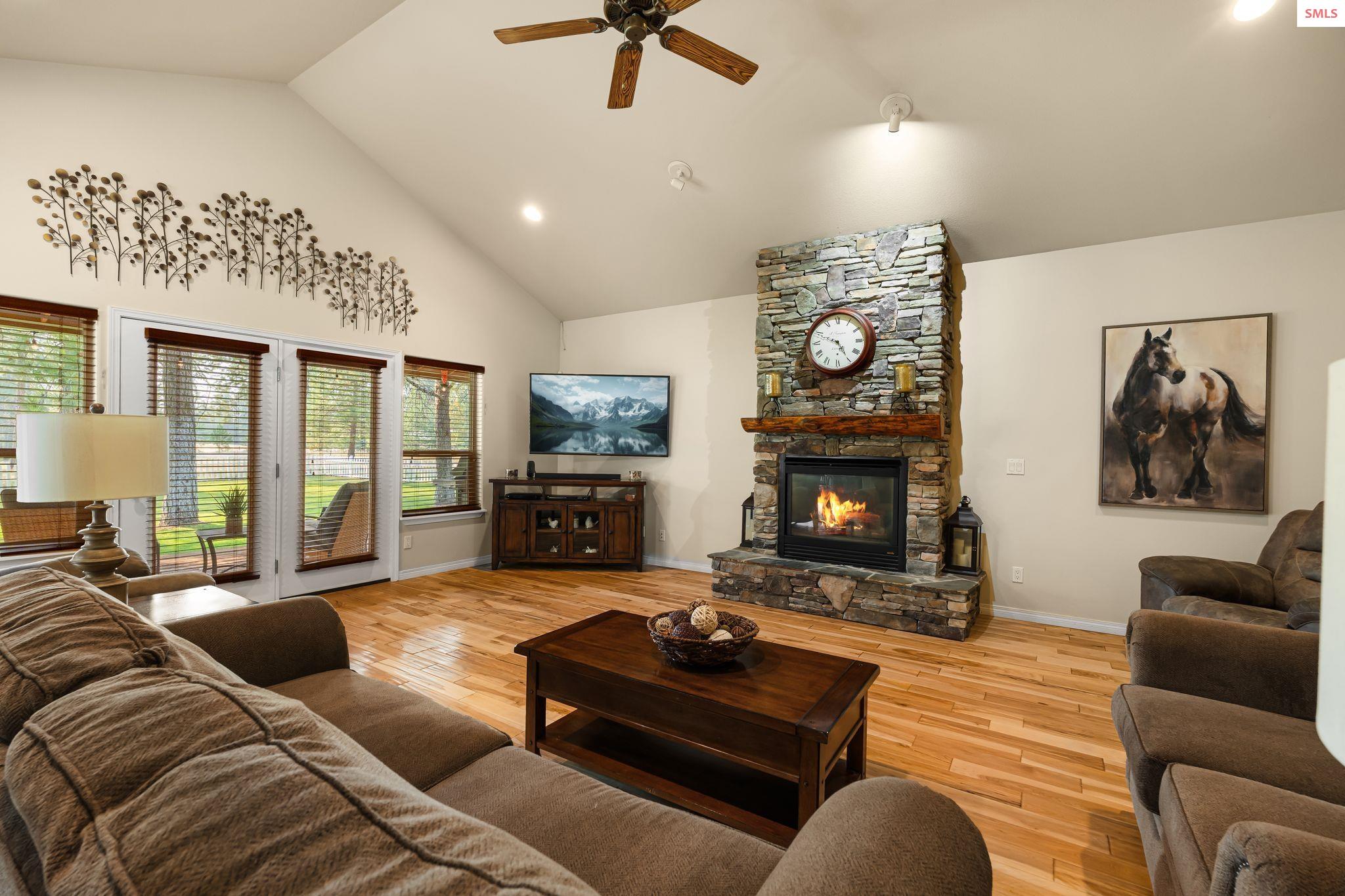 31957 North Wester Ranch Road Athol, ID 83801 - Photo 8 of 66 Living room with beautiful fire place