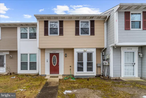 a view of a yard in front of a house
