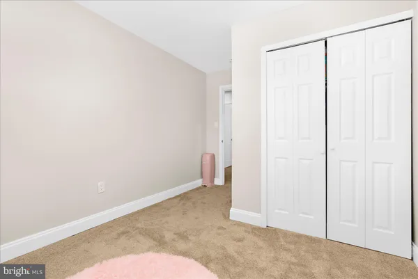 a bathroom with a sink a toilet and vanity