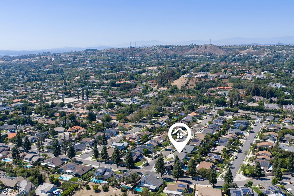 1663 North Yurok Street Orange, CA 92867 - Photo 28 of 31 an aerial view of a city with lots of residential buildings