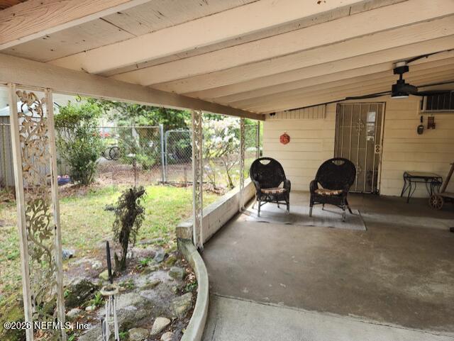 7915 Fresca Street Jacksonville, FL 32217 - Photo 19 of 20 a view of a room and balcony with furniture
