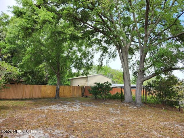 7915 Fresca Street Jacksonville, FL 32217 - Photo 20 of 20 an outdoor space with a tree