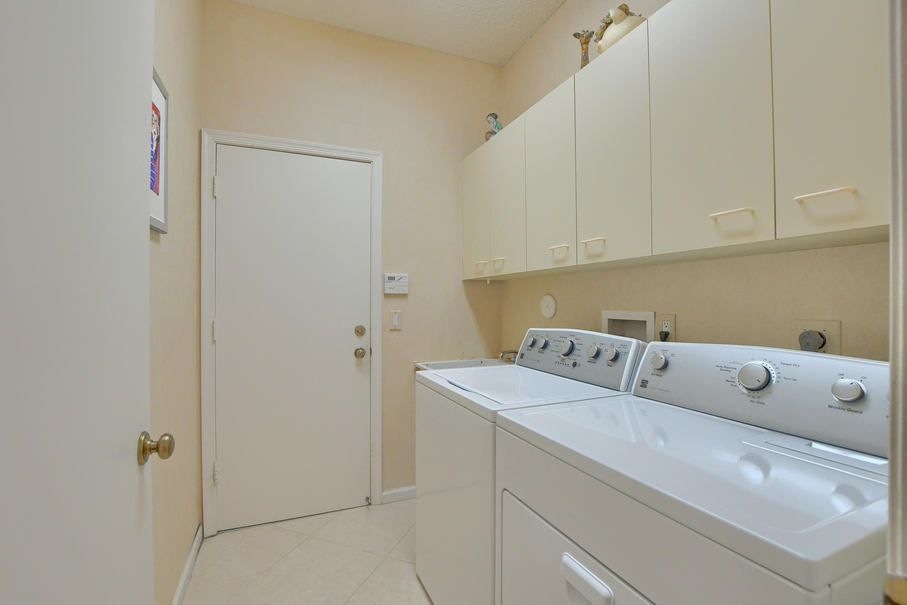 2424 Northwest 63rd Street Boca Raton, FL 33496 - Photo 29 of 35 laundry room