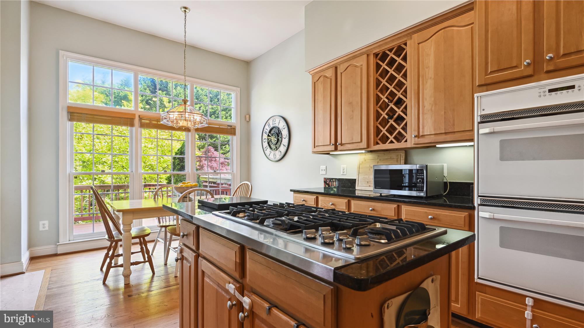 7905 Turncrest Drive Potomac, MD 20854 - Photo 15 of 56 Island w/ cooktop; SS appliances; granite counters