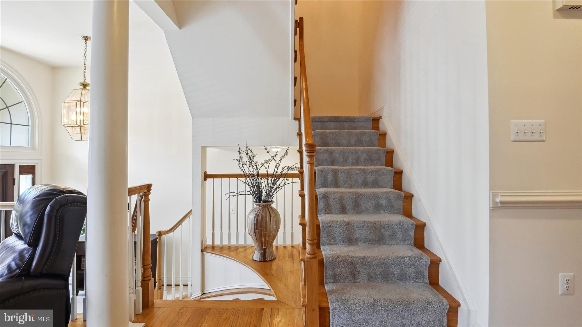 7905 Turncrest Drive Potomac, MD 20854 - Photo 21 of 56 Elegant carpeted runner on hardwood stairs