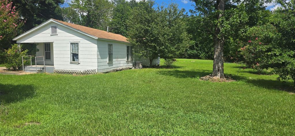 409 Elm Street Cullen, LA 71075 - Photo 11 of 12 a front view of house with yard and green space