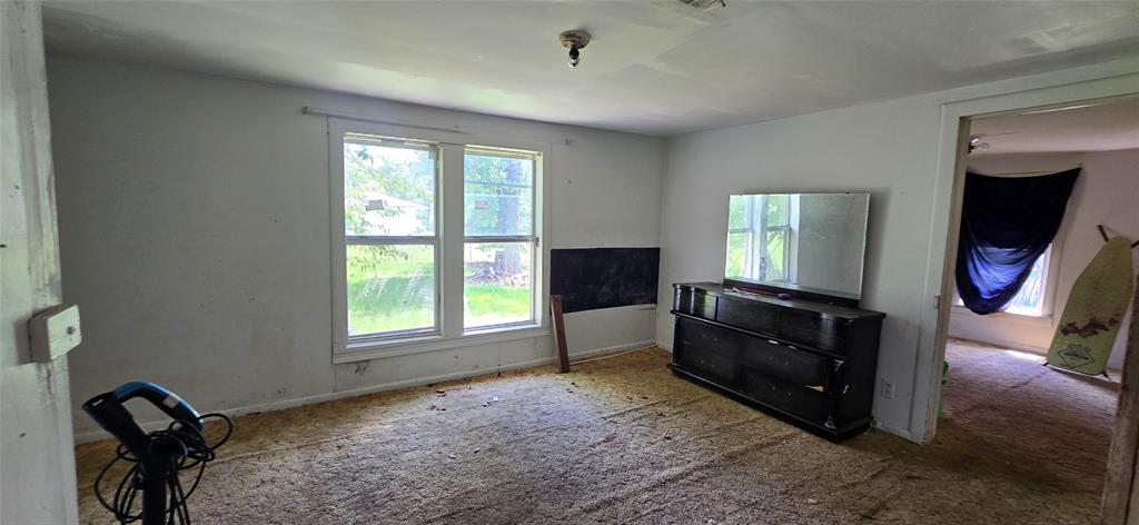 409 Elm Street Cullen, LA 71075 - Photo 4 of 12 a room with furniture and a window