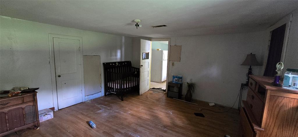 409 Elm Street Cullen, LA 71075 - Photo 6 of 12 a view of a livingroom with furniture and a flat screen tv