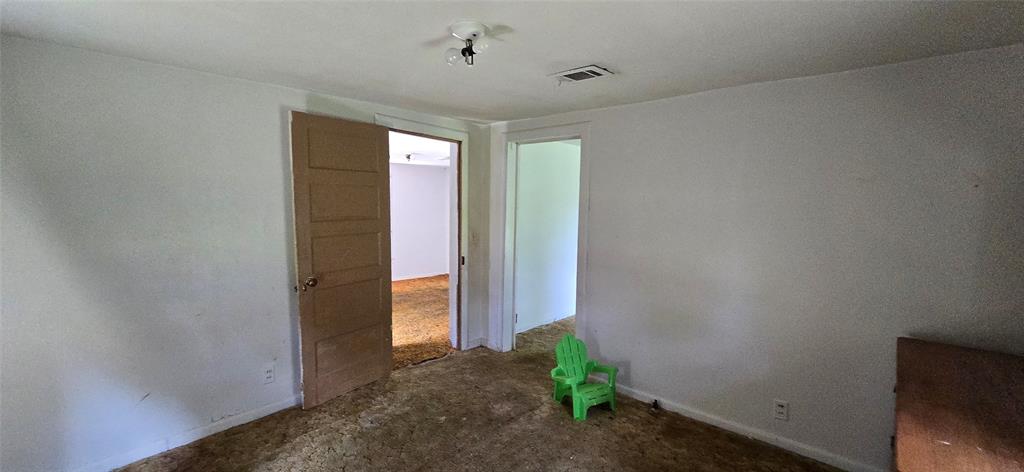 409 Elm Street Cullen, LA 71075 - Photo 7 of 12 a view of an empty room with a window