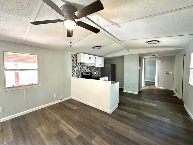 a view of a city with green space