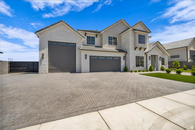 1620 Belayer Drive St. George, UT 84770 - Photo 2 of 51 Contemporary home showcasing a white brick and stucco exterior