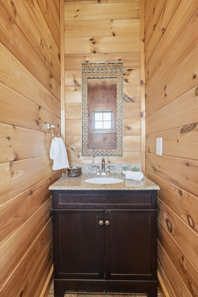 1823 Shoal Creek Road Clarkesville, GA 30523 - Photo 40 of 149 a view of bathroom with a sink and mirror