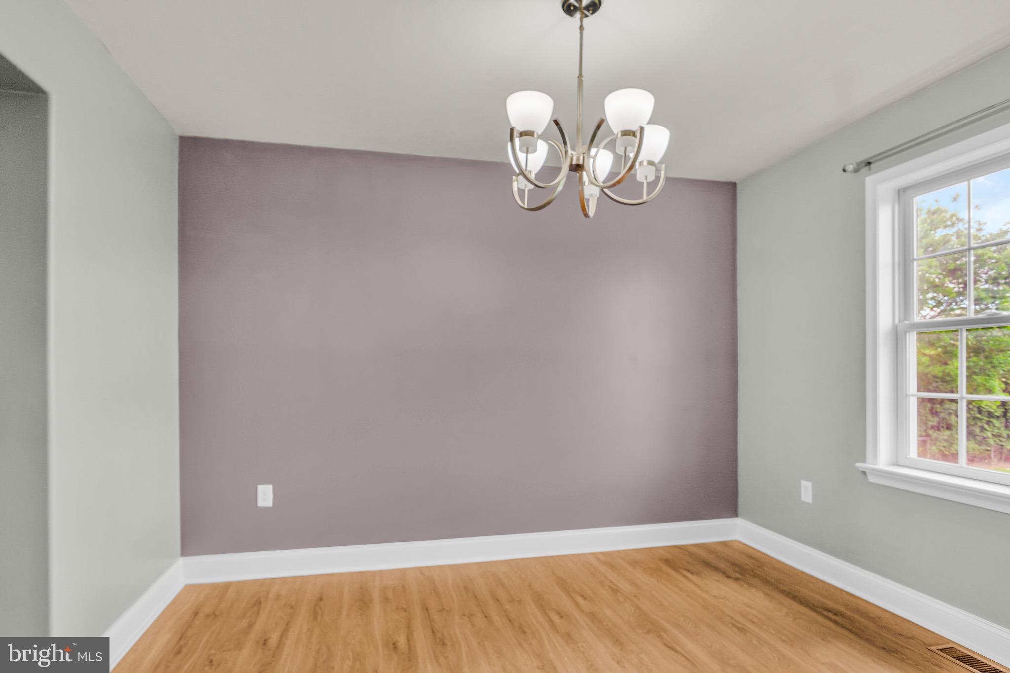 25 Springbrook Drive Palmyra, PA 17078 - Photo 8 of 34 a view of wooden floor and chandelier in a room