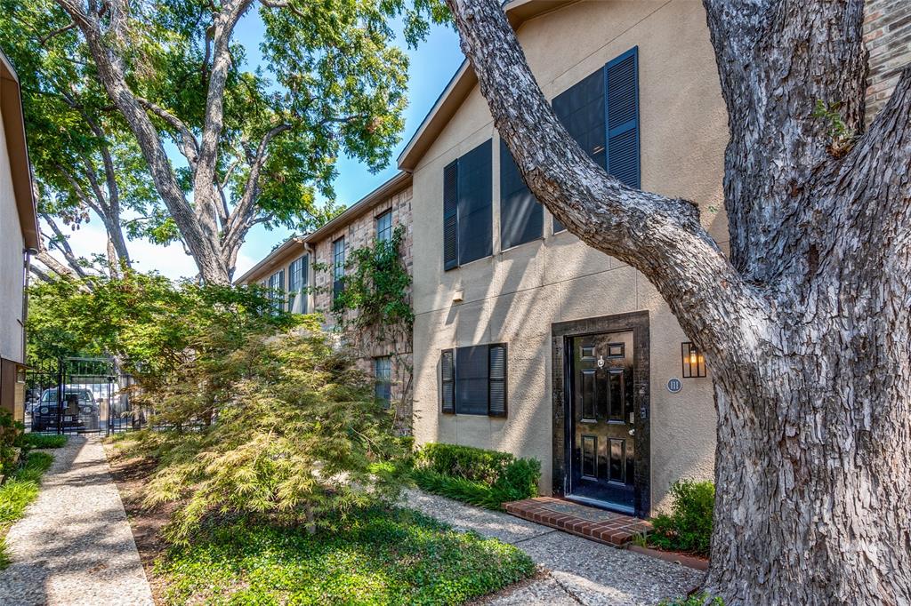 3320 Reagan Street, Unit 111 Dallas, TX 75219 - Photo 1 of 1 a view of a house with brick walls