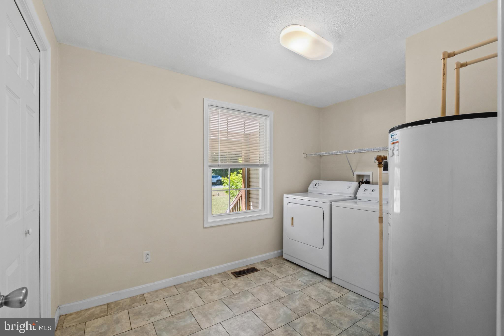 23116 Gilpin Point Road Preston, MD 21655 - Photo 33 of 66 Large laundry and storage area.