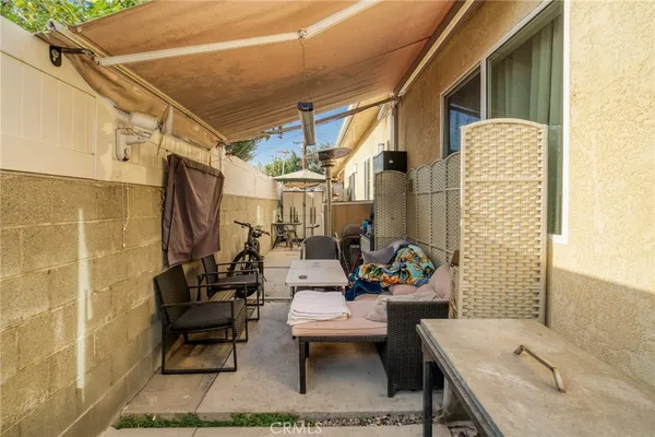 a outdoor space with patio couch and a couch