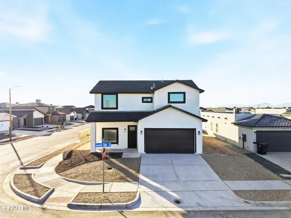 a aerial view of a house with entertaining space
